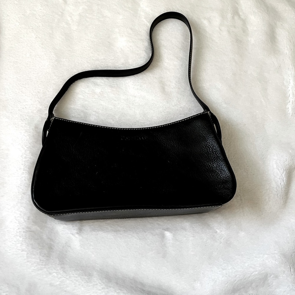 This is a black Cole Haan bag.